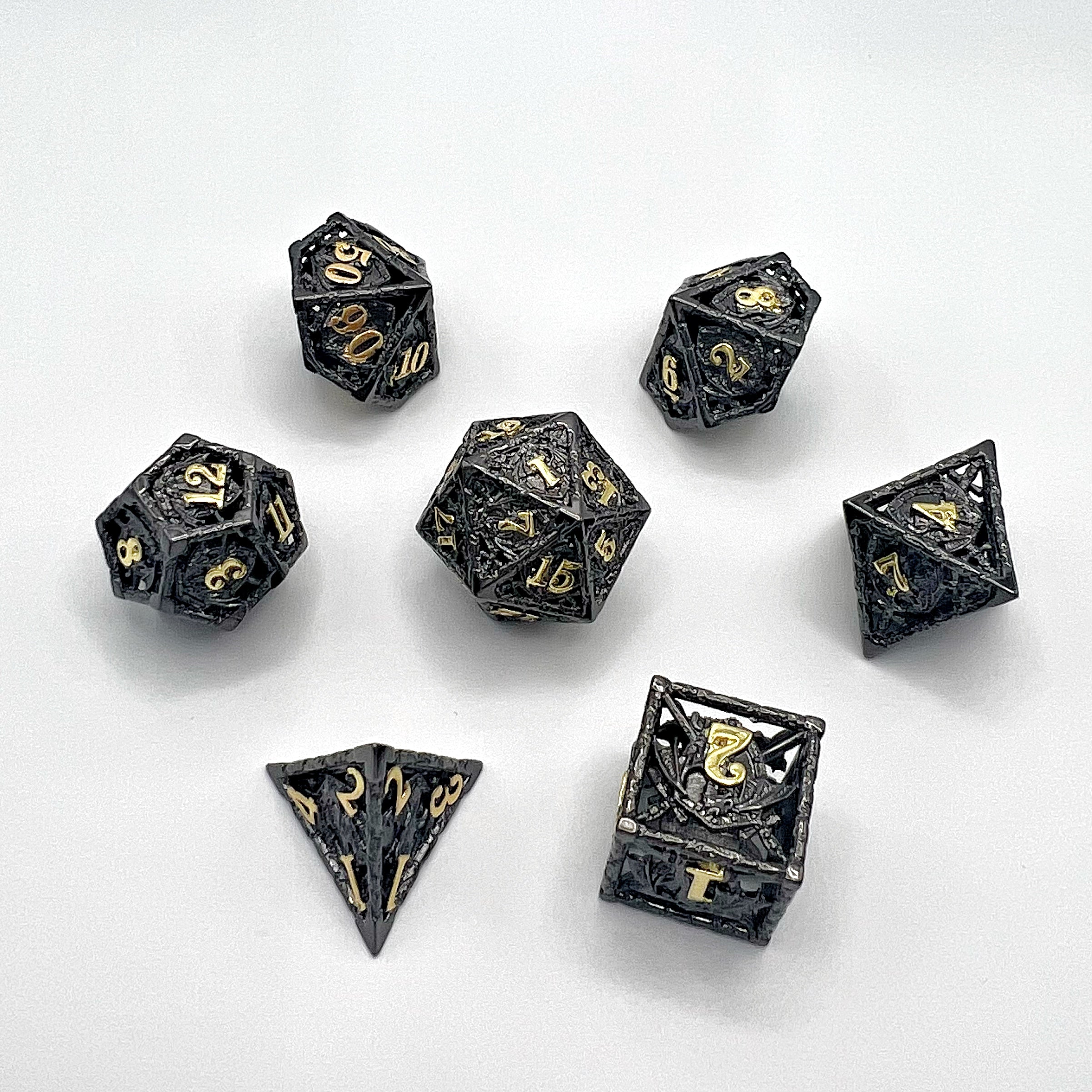 Shield Dragon Hollow Metal Dice Set - Black Nickel w/ Gold