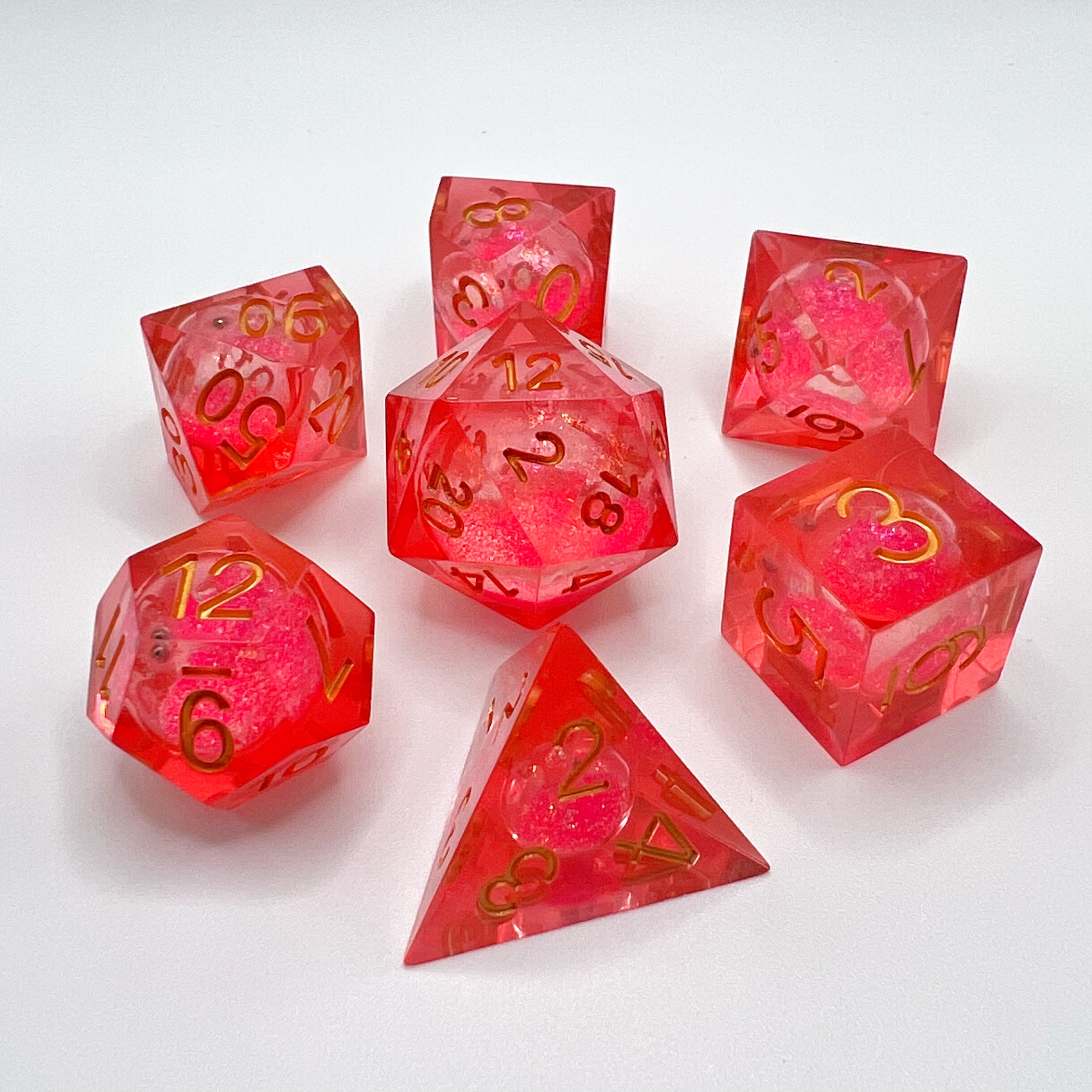 Quicksand Liquid Core Dice Set - Transparent Red w/ Gold