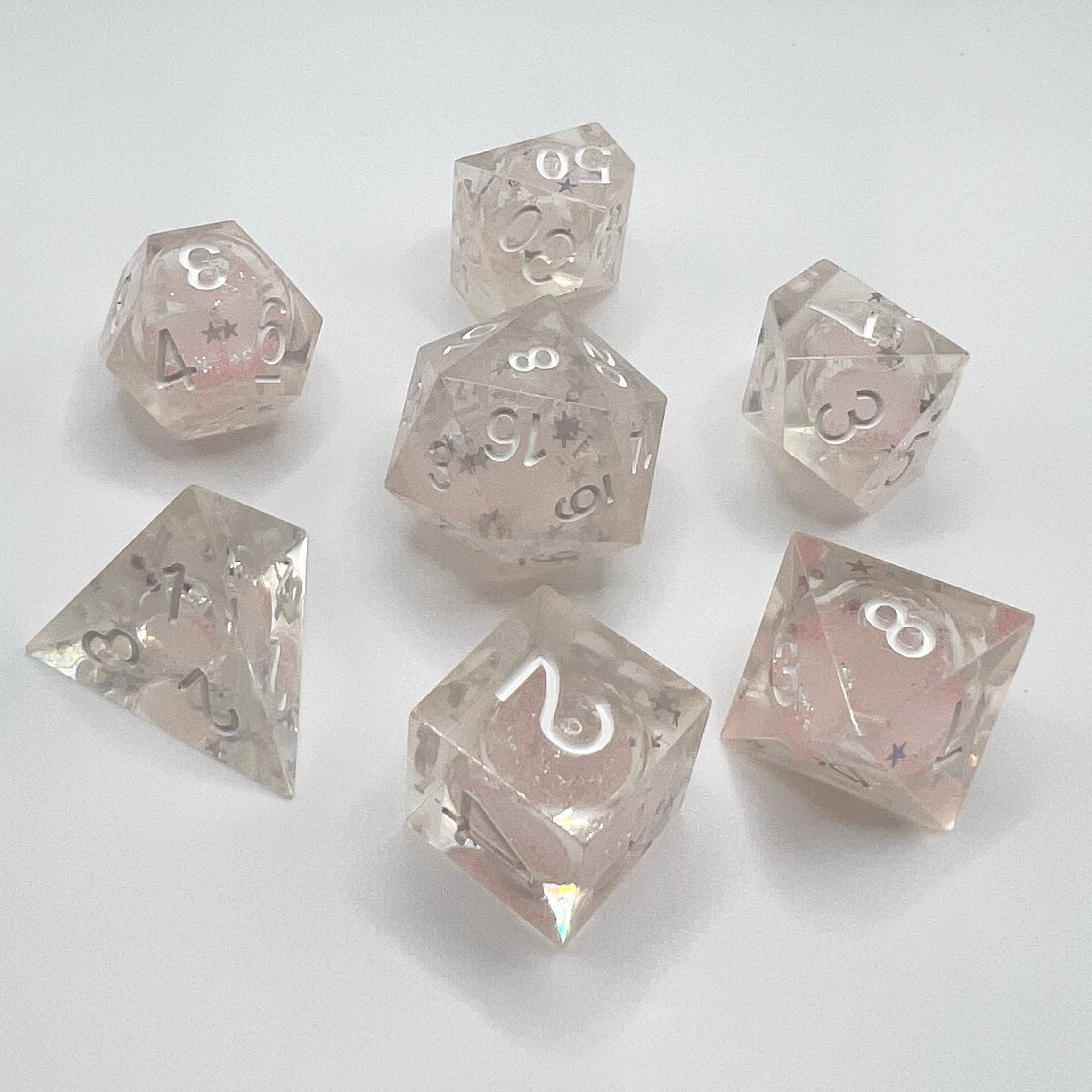 Quicksand Liquid Core Dice Set - Transparent Star w/ White