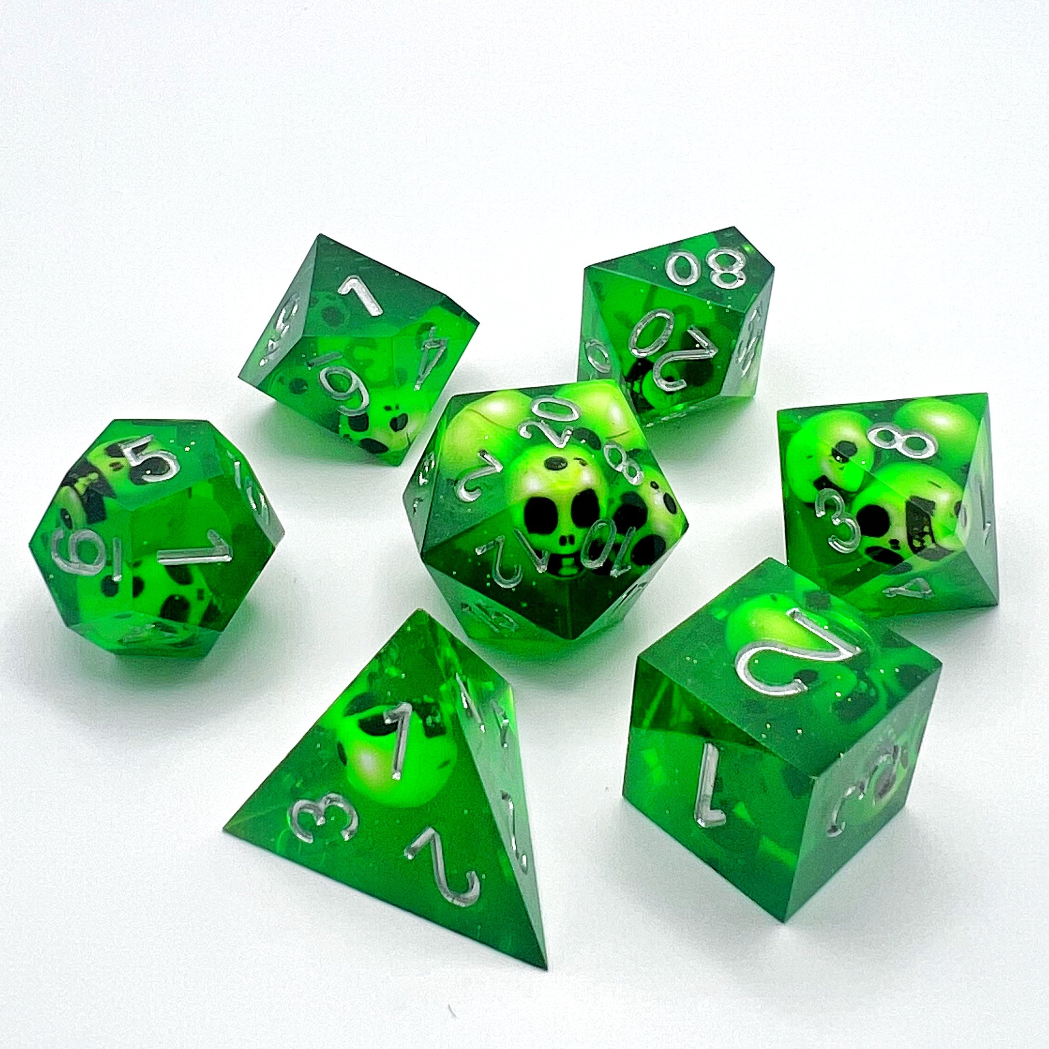 Sharp Edge Resin Dice Set - Transparent Skull Green w/ Silver