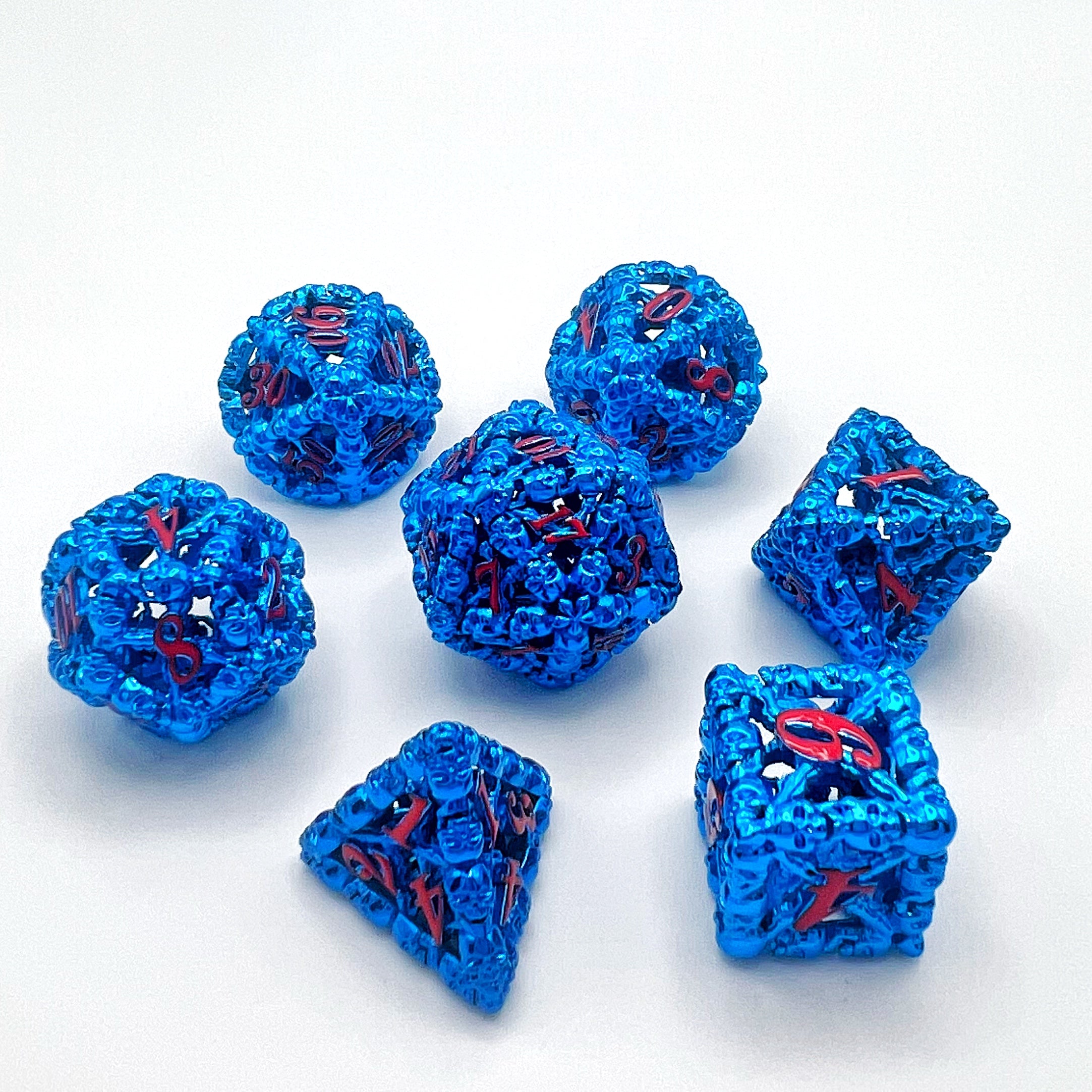 Skull Edge Hollow Metal Dice Set - Blue w/ Red