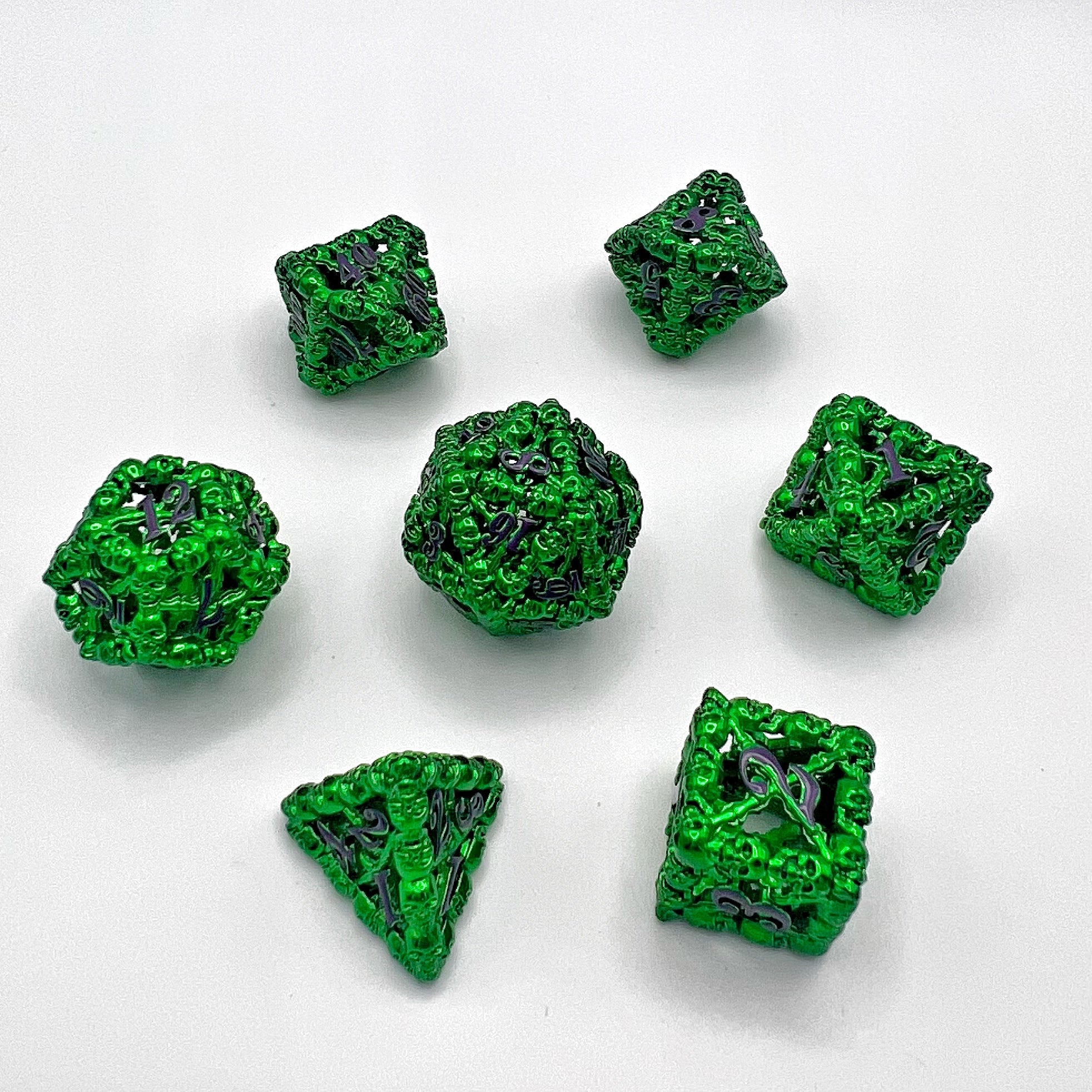 Skull Edge Hollow Metal Dice Set - Green w/ Purple